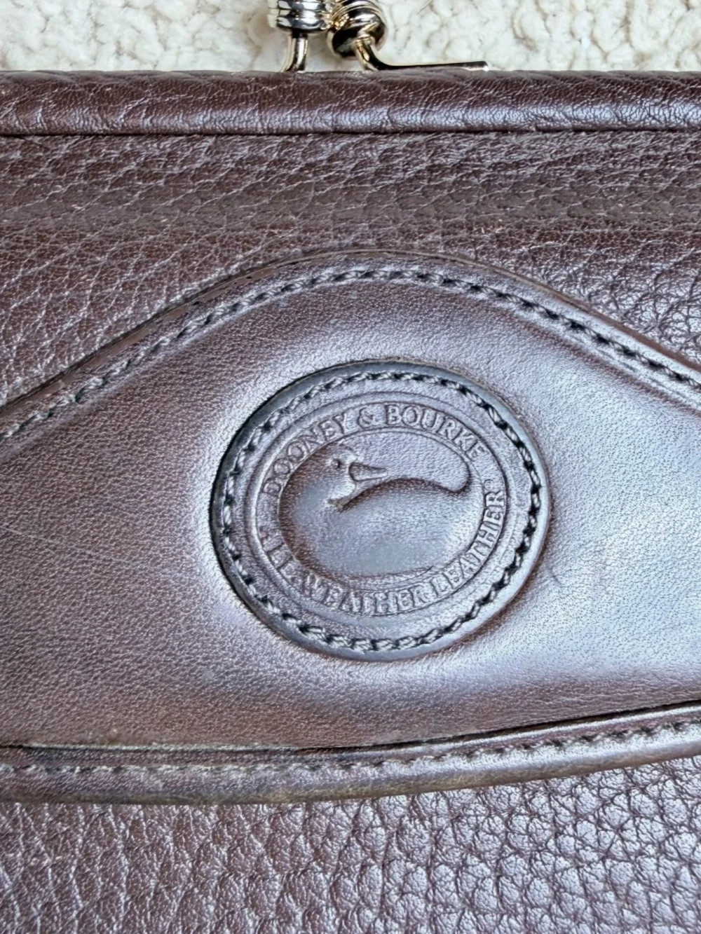 Dooney & Bourke All-Weather Leather kiss-lock Wallet Pebbled Leather Brown